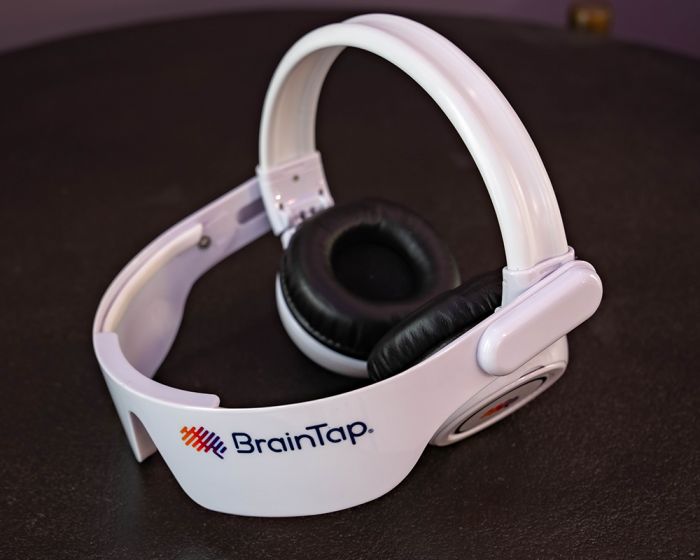 woman wearing BrainTap device